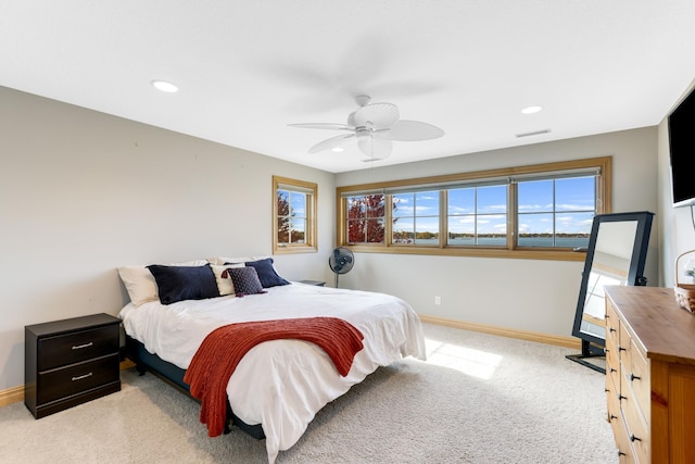 22620 Hayward Ave N, Forest Lake, MN 55025 - bedroom featuring light colored carpet, multiple windows, recessed lighting, and a ceiling fan