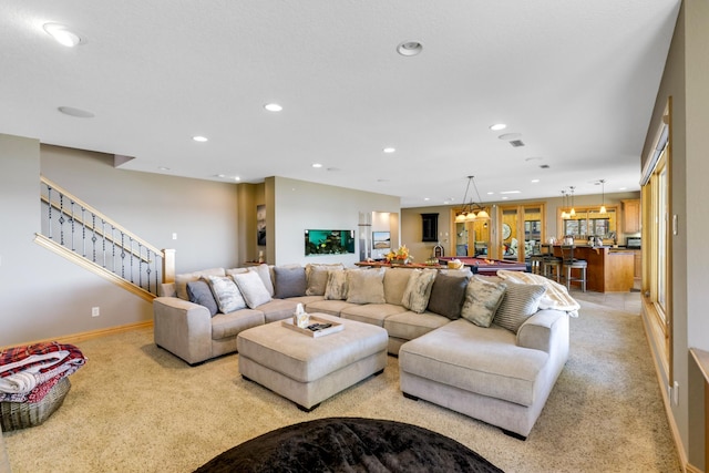 22620 Hayward Ave N, Forest Lake, MN 55025 - living area featuring recessed lighting, light colored carpet, and stairs