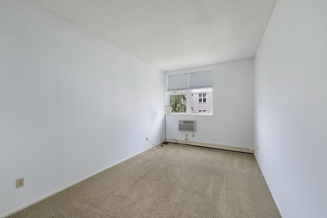 215 7th St NE Unit 205, Minneapolis, MN 55413 - empty room with baseboard heating, carpet, a textured ceiling, and a wall mounted air conditioner