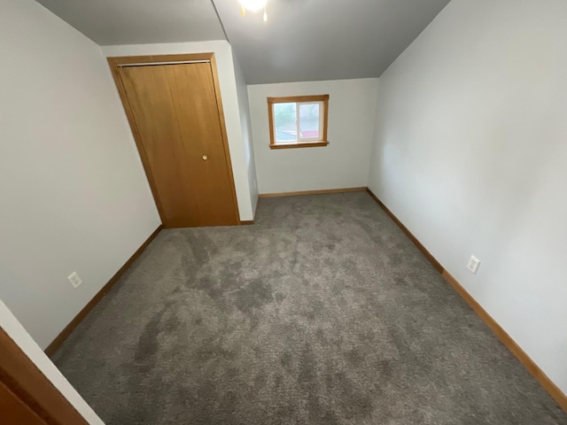 108 Johnson St NE, Brownsdale, MN 55918 - unfurnished bedroom with carpet and a closet