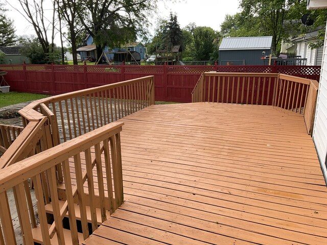 108 Johnson St NE, Brownsdale, MN 55918 - wooden terrace with a fenced backyard