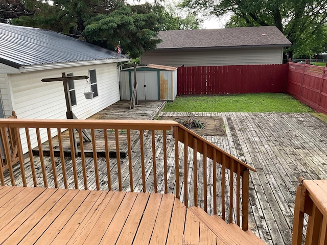 108 Johnson St NE, Brownsdale, MN 55918 - deck with a storage unit and a fenced backyard