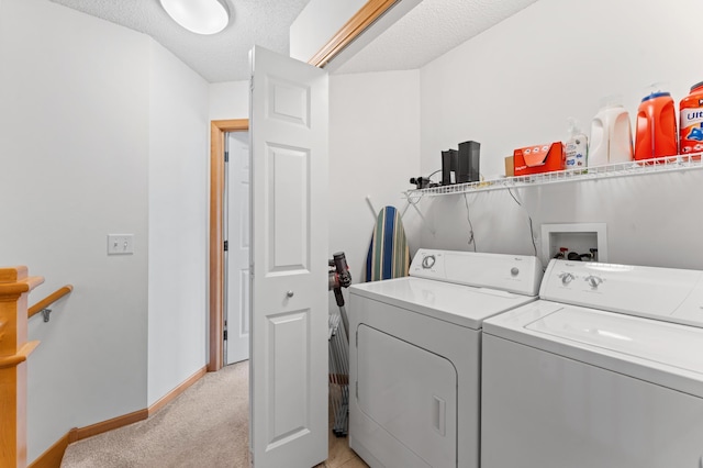 15588 Early Bird Cir Unit 1704, Apple Valley, MN 55124 - washroom with separate washer and dryer, light carpet, and a textured ceiling