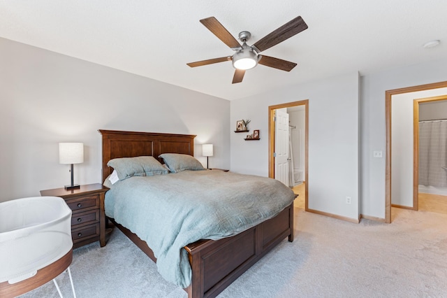 15588 Early Bird Cir Unit 1704, Apple Valley, MN 55124 - bedroom with light carpet, a ceiling fan, and connected bathroom