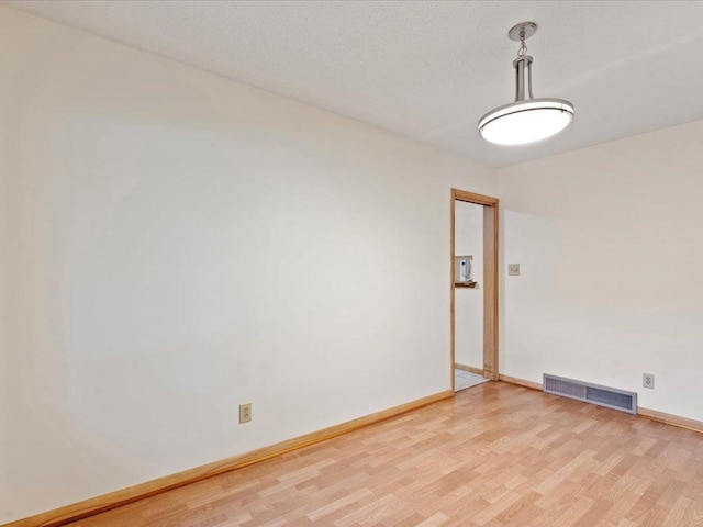 517 Cedar St, Brainerd, MN 56401 - spare room featuring light wood-style flooring and baseboards