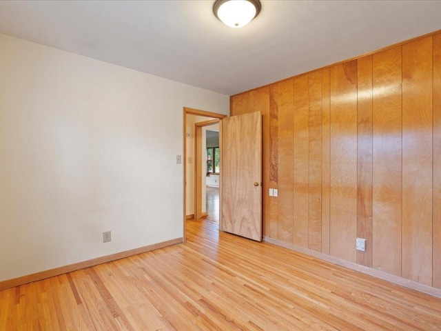 517 Cedar St, Brainerd, MN 56401 - empty room with wood finished floors and baseboards