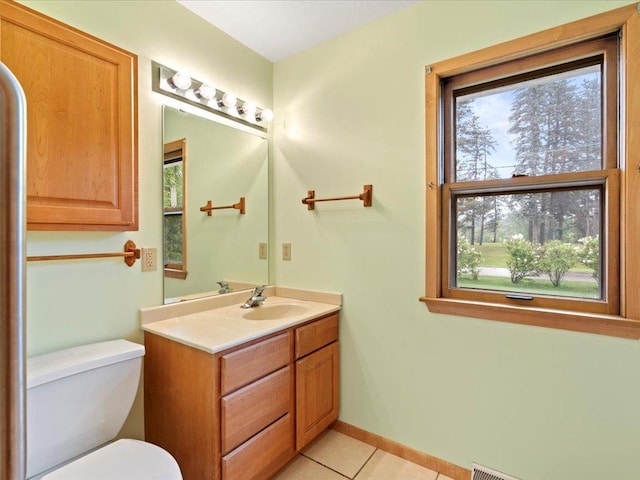 517 Cedar St, Brainerd, MN 56401 - half bath with vanity and tile patterned floors