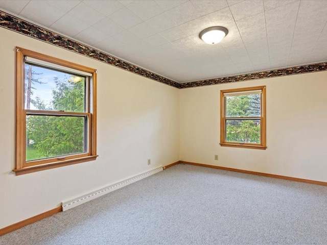 517 Cedar St, Brainerd, MN 56401 - carpeted spare room with a baseboard radiator and baseboards
