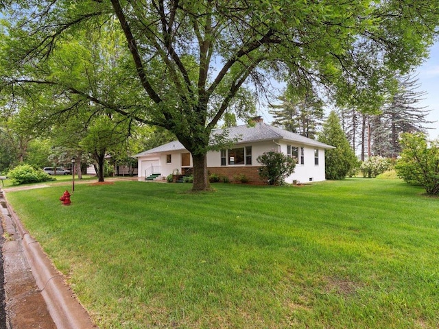 517 Cedar St, Brainerd, MN 56401 - view of front of home featuring a front yard, brick siding, and a chimney