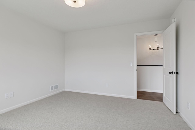 1096 Prospect Pointe Rd, Jordan, MN 55352 - unfurnished room with carpet and a chandelier