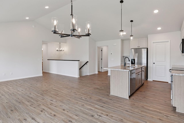 1096 Prospect Pointe Rd, Jordan, MN 55352 - kitchen with dishwasher, a chandelier, open floor plan, light wood finished floors, and recessed lighting