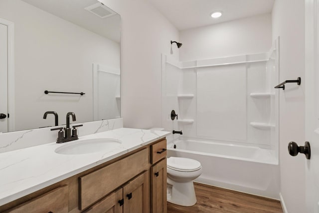 1096 Prospect Pointe Rd, Jordan, MN 55352 - full bathroom with vanity, shower / bathtub combination, and wood finished floors