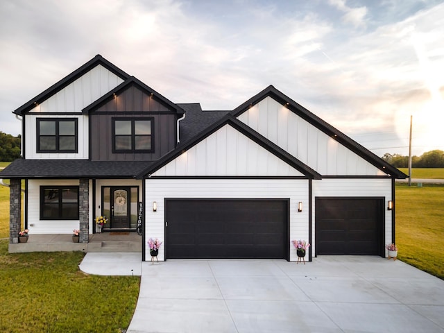 1205 Skyview Cir NW, Rochester, MN 55901 - modern inspired farmhouse featuring an attached garage, board and batten siding, a front yard, and driveway