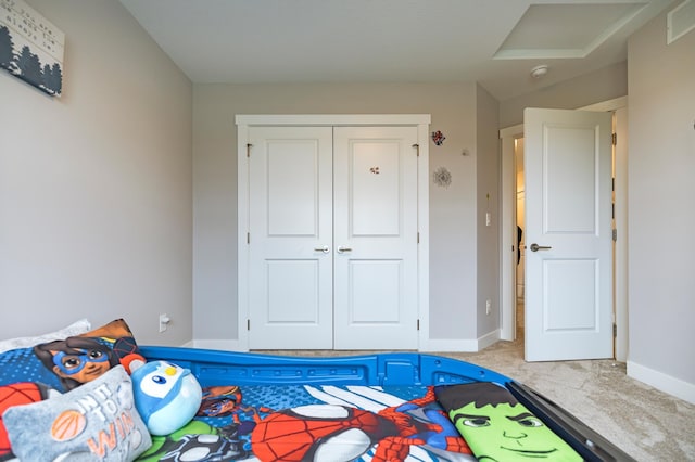 1205 Skyview Cir NW, Rochester, MN 55901 - carpeted bedroom with a closet and attic access