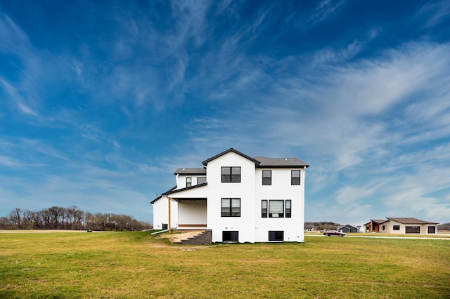 1205 Skyview Cir NW, Rochester, MN 55901 - back of house featuring a lawn