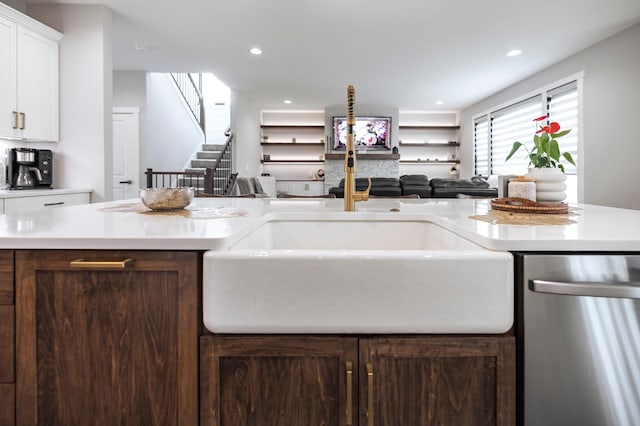 1205 Skyview Cir NW, Rochester, MN 55901 - kitchen featuring stainless steel dishwasher, open floor plan, light countertops, white cabinetry, and recessed lighting