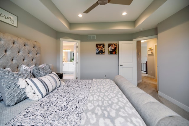 1205 Skyview Cir NW, Rochester, MN 55901 - bedroom with carpet flooring, a raised ceiling, ensuite bathroom, ceiling fan, and recessed lighting