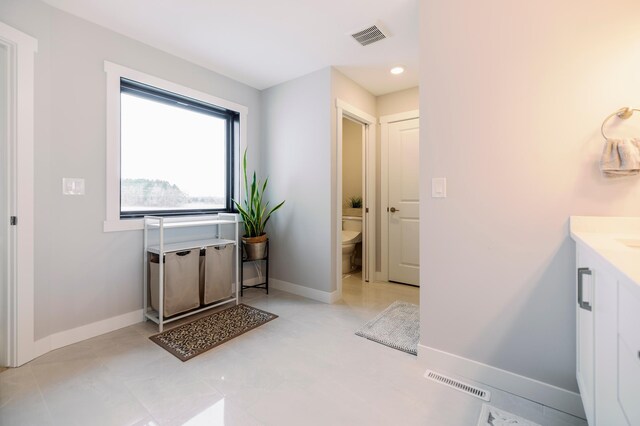 1205 Skyview Cir NW, Rochester, MN 55901 - bathroom featuring vanity and recessed lighting