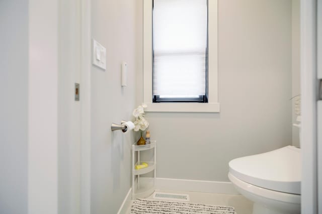 1205 Skyview Cir NW, Rochester, MN 55901 - bathroom with baseboards and tile patterned floors