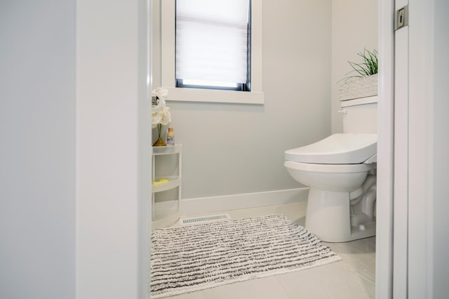 1205 Skyview Cir NW, Rochester, MN 55901 - half bath with toilet and tile patterned floors