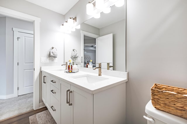 1205 Skyview Cir NW, Rochester, MN 55901 - bathroom with double vanity and wood finished floors