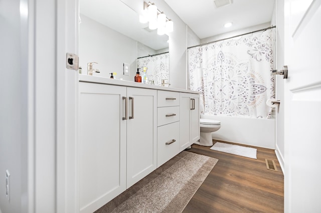 1205 Skyview Cir NW, Rochester, MN 55901 - full bathroom featuring vanity, wood finished floors, and shower / bathtub combination with curtain