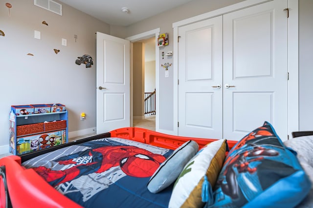1205 Skyview Cir NW, Rochester, MN 55901 - bedroom featuring a closet and baseboards