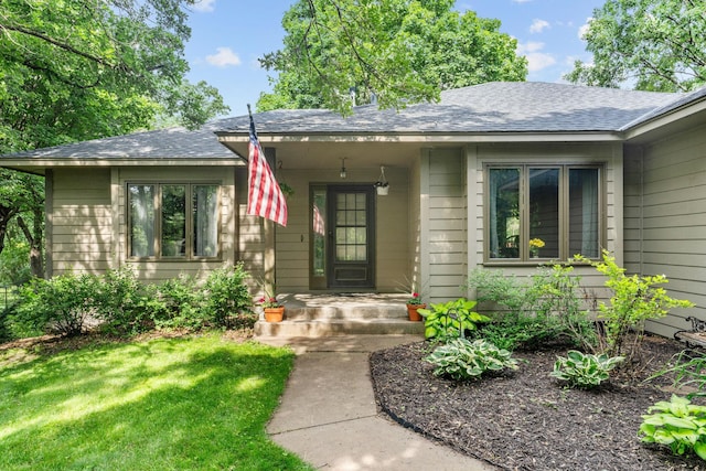 13790 Crane St NW, Andover, MN 55304 - view of exterior entry with a shingled roof