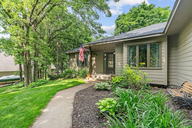 13790 Crane St NW, Andover, MN 55304 - property entrance with a lawn and roof with shingles