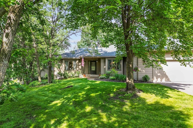 13790 Crane St NW, Andover, MN 55304 - view of front of property featuring a garage, concrete driveway, and a front yard
