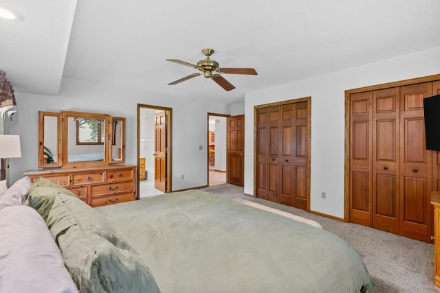 13790 Crane St NW, Andover, MN 55304 - bedroom with two closets, light colored carpet, ceiling fan, and ensuite bath