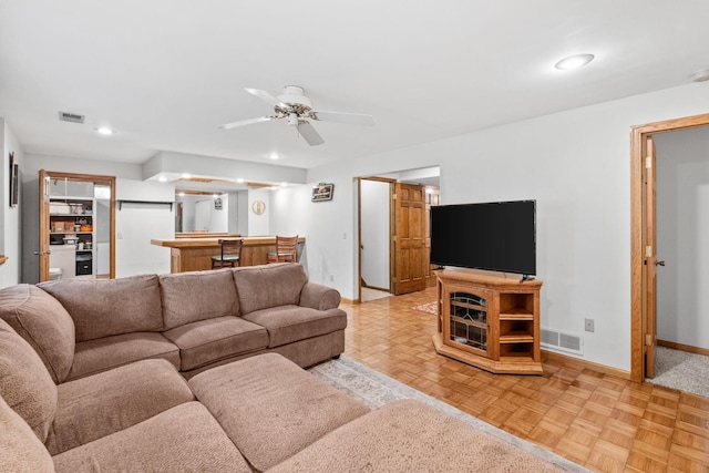 13790 Crane St NW, Andover, MN 55304 - living room with wet bar, a ceiling fan, and recessed lighting
