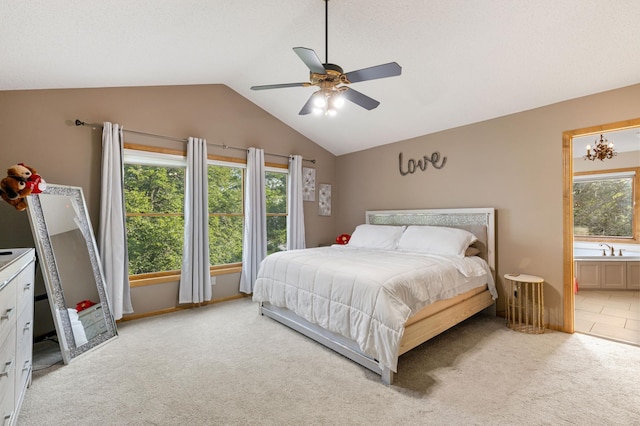 13845 Essex Trl, Apple Valley, MN 55124 - bedroom featuring light colored carpet, vaulted ceiling, connected bathroom, and ceiling fan