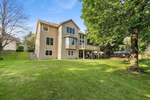 13845 Essex Trl, Apple Valley, MN 55124 - rear view of property featuring a yard and a deck