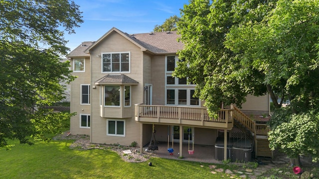 13845 Essex Trl, Apple Valley, MN 55124 - back of house featuring a patio area, a lawn, a deck, roof with shingles, and stairway