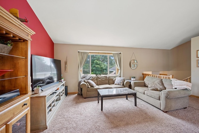 853 Texas Ct NW, Hutchinson, MN 55350 - carpeted living room featuring lofted ceiling and baseboards