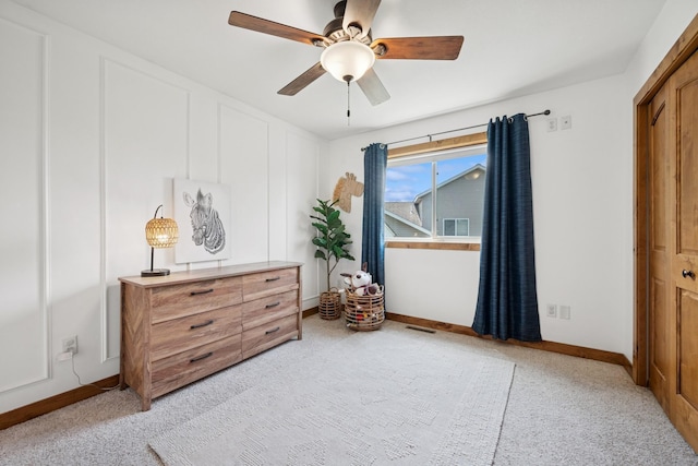853 Texas Ct NW, Hutchinson, MN 55350 - bedroom featuring light colored carpet and a ceiling fan