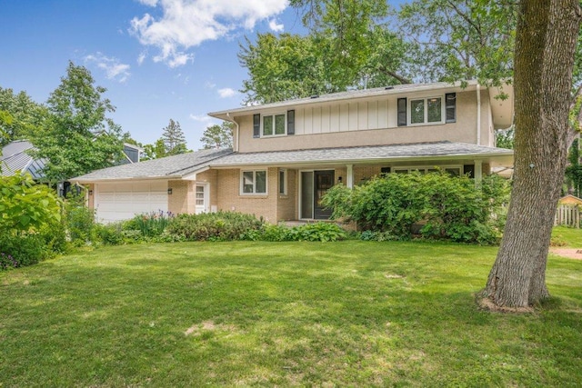 237 Campbell Dr, Hopkins, MN 55343 - traditional-style home featuring a garage and a front lawn