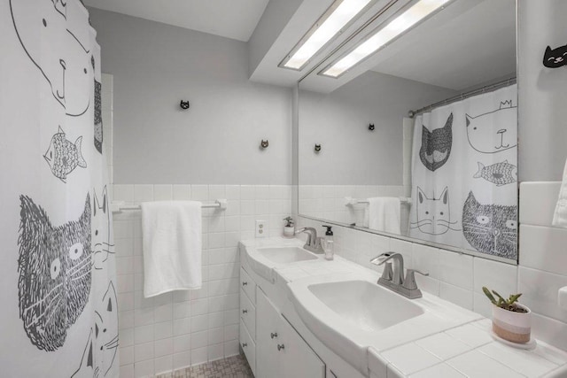 237 Campbell Dr, Hopkins, MN 55343 - bathroom with double vanity and tile walls
