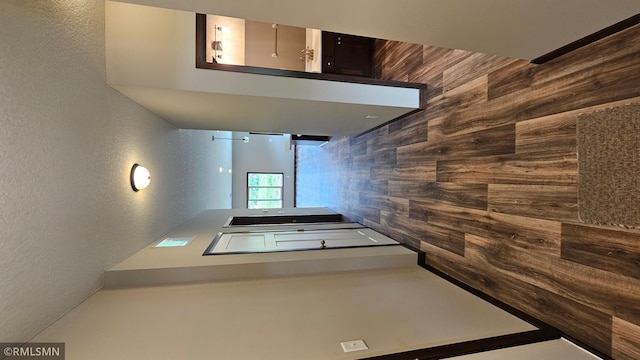 3104 Zuni St, Anoka, MN 55303 - corridor featuring a textured wall and wooden walls
