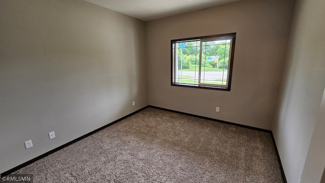 3104 Zuni St, Anoka, MN 55303 - carpeted empty room with baseboards