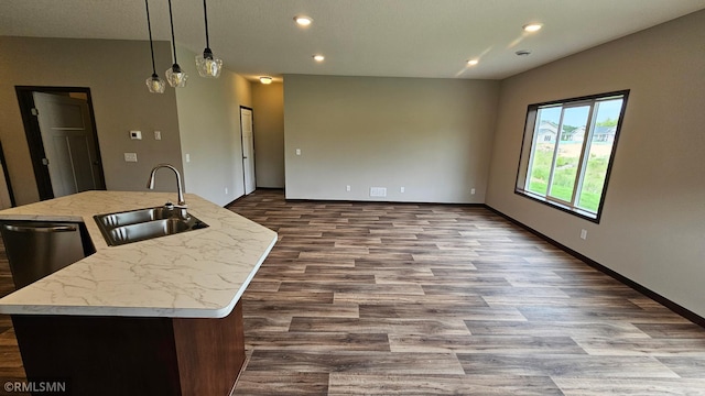 3104 Zuni St, Anoka, MN 55303 - kitchen featuring dark wood-style flooring, an island with sink, recessed lighting, decorative light fixtures, and dishwasher