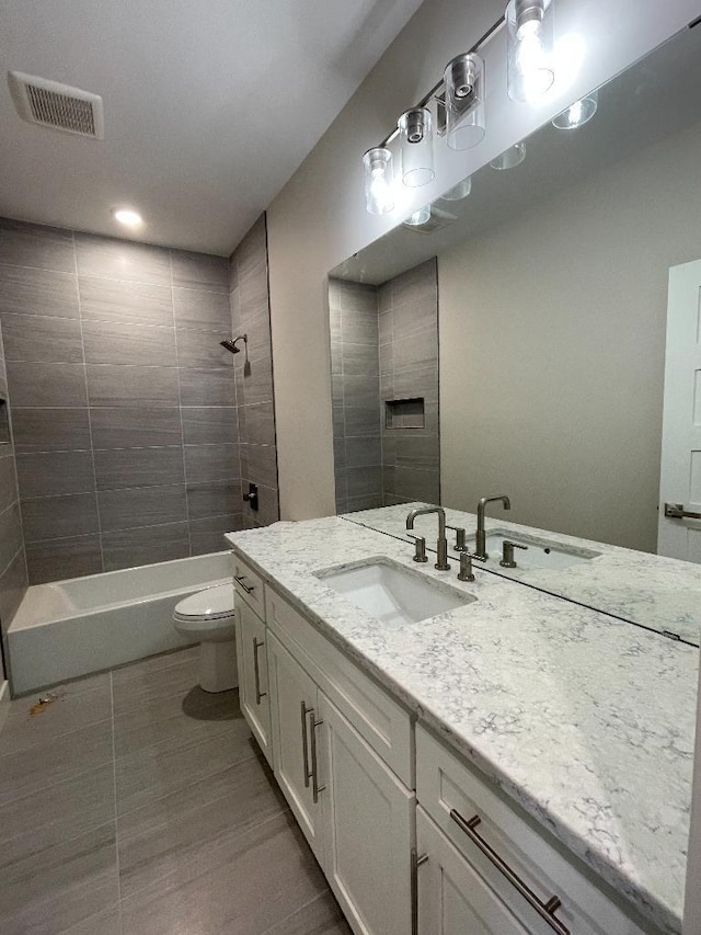1945 Spruce Meadows Dr SE, Rochester, MN 55904 - bathroom featuring vanity, washtub / shower combination, and recessed lighting