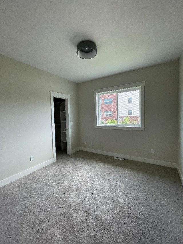 1945 Spruce Meadows Dr SE, Rochester, MN 55904 - unfurnished bedroom featuring carpet floors and a closet