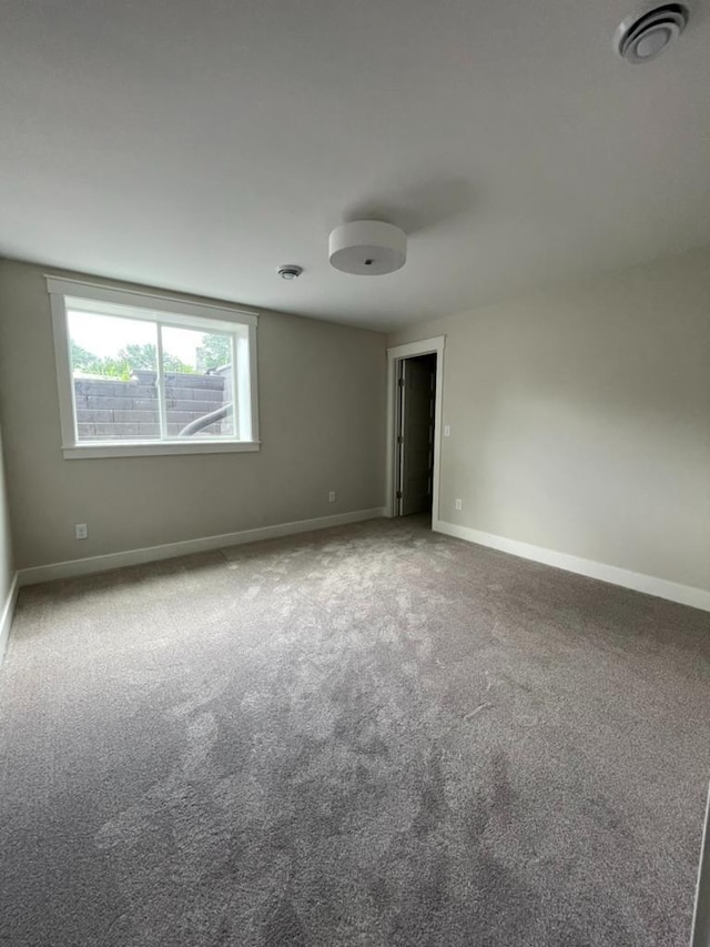 1945 Spruce Meadows Dr SE, Rochester, MN 55904 - empty room featuring baseboards and carpet