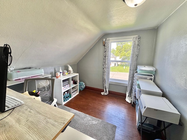 420 7th St, Marshall, MN 56258 - office space with a textured ceiling, wood finished floors, vaulted ceiling, and a textured wall