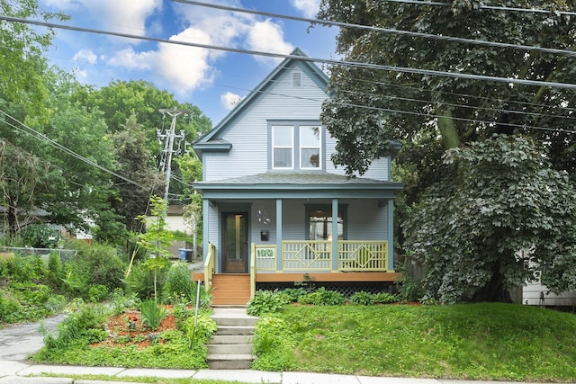 1112 29th Ave NE, Minneapolis, MN 55418 - view of front facade featuring a porch, a front lawn, and stairs