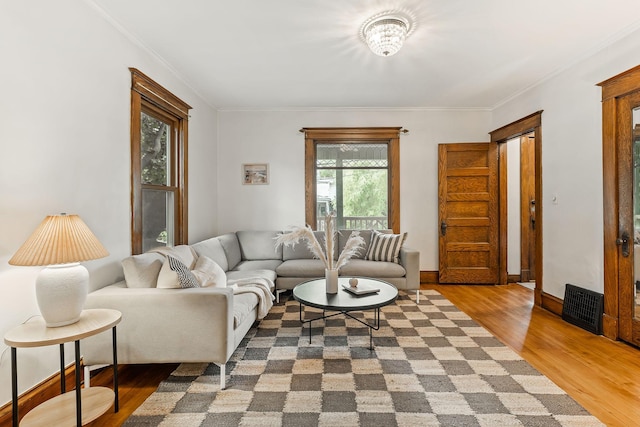 1112 29th Ave NE, Minneapolis, MN 55418 - living room with wood finished floors and ornamental molding