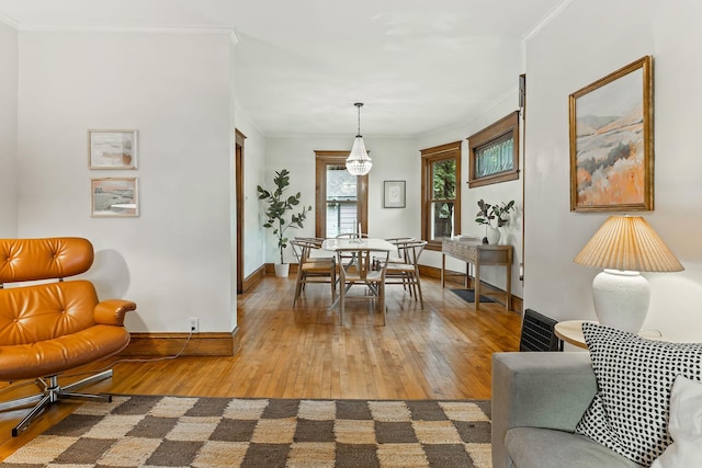1112 29th Ave NE, Minneapolis, MN 55418 - dining room with light wood-type flooring and crown molding