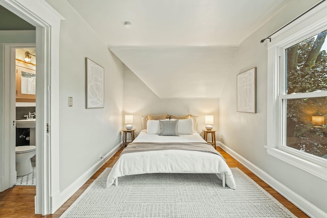 1112 29th Ave NE, Minneapolis, MN 55418 - bedroom featuring wood finished floors and baseboards
